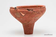Funnel shape pottery from Stratum II.)